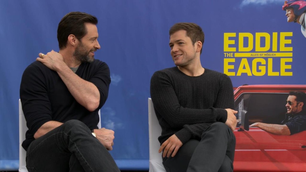Hugh Jackman und Taron Egerton in Eddie the Eagle - AUDIO VIDEO FOTO BILD