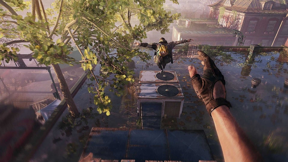 A man follows another over the roof of a house.