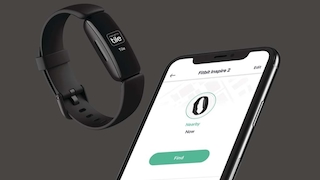 Die Fitbit Inspire 2 und ein Smartphone