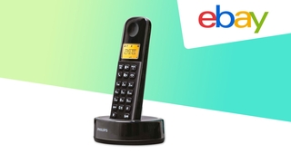 DECT-Telefon Philips D1651B neben Ebay-Logo
