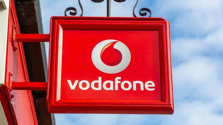 Vodafone-Schild an einer Häuserwand