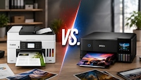 Canon MAXIFY GX7150 und Epson EcoTank ET-8550 zusammen auf einem Bild, getrennt durch einen "VS."-Schriftzug