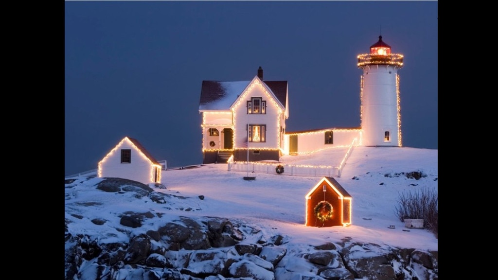 Christmas Lighthouse: Wallpaper mit leuchtenden Häusern