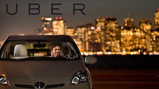 Uber-Logo mit Auto
