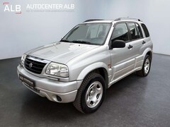 Bild des Angebotes Suzuki Grand Vitara 5-trg./1.HAND/4X4/AUTOMATIK/AHK 2.5