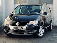 Bild des Angebotes VW Touran *XENON*NAVI*SHZ*TEMPO*PDC*7-SITZER*KLIMA*