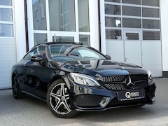 Bild des Angebotes Mercedes-Benz C 250 9G AMG 4Matic *ALL BLACK*PANO*360°KAM*MEMO