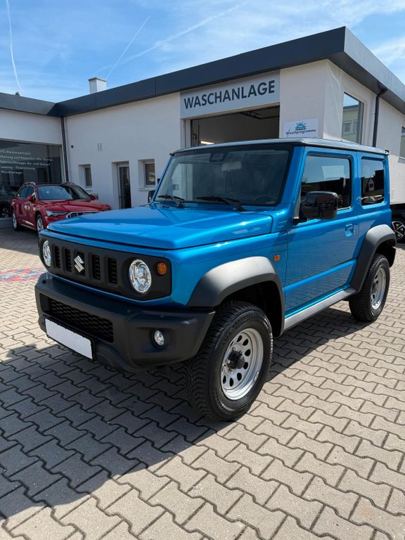 Bild des Angebotes Suzuki Jimny Comfort AllGrip NAVI SHZ 5-GANG SCHECKHEFT