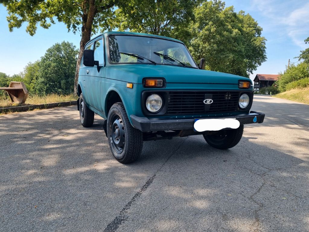 Bild des Angebotes Lada Niva 1.7i 21214 / Raptorlack