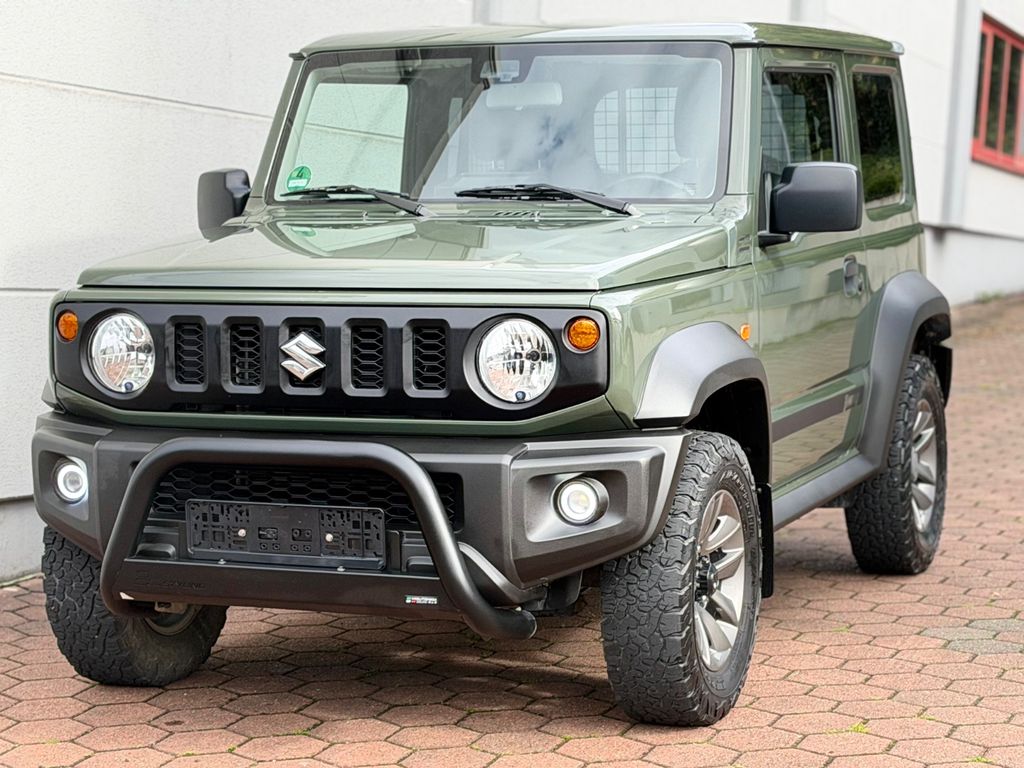 Bild des Angebotes Suzuki Jimny Comfort+ AHK°RFK°SZHG°ALU°KLIMA°CARPLAY