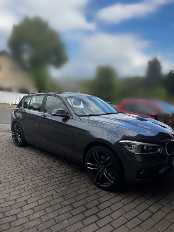 Bild des Angebotes BMW 120i Automatik I Schiebedach I Navi I Leder