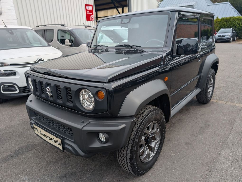 Bild des Angebotes Suzuki Jimny Comfort+ AllGrip Navi+Cam/Klimaaut./Alu