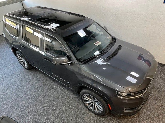 Jeep GRAND WAGONEER 6.4L V-8 LPG  NIGHT VIEW 1. HAND